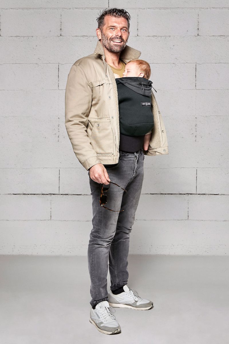 Dad babywearing his baby in an ergonomic carrier the HoodieCarrier